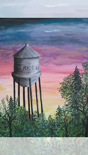 Painting of a water tower labeled "RICE L" standing above treetops, with a colorful sunset sky in the background. - Rice Lake Chamber of Commerce